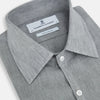 View 2 of product The Grey Linen Westminster Shirt by Turnbull & Asser is a long-sleeve, light gray button-up with a formal collar and white buttons, highlighting British craftsmanship and laid flat on a white background.