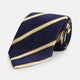 The Yellow and White Blazer Silk Tie by Turnbull & Asser, featuring diagonal white and yellow stripes on navy blue, is shown rolled up against a light gray background.
