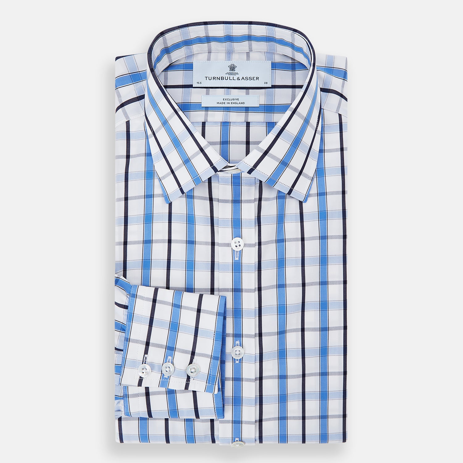 View 5 of product The Turnbull & Asser Blue and Navy Combination Check Mayfair Shirt features a classic button-up style with long sleeves, T&A collar, and a blue, navy, and white check pattern, shown against a plain white background.