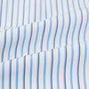 View 6 of product The Blue and Navy Double Stripe Mayfair Shirt by Turnbull & Asser features a classic T&A collar and thin blue stripes on a white background, displayed against a plain white surface.