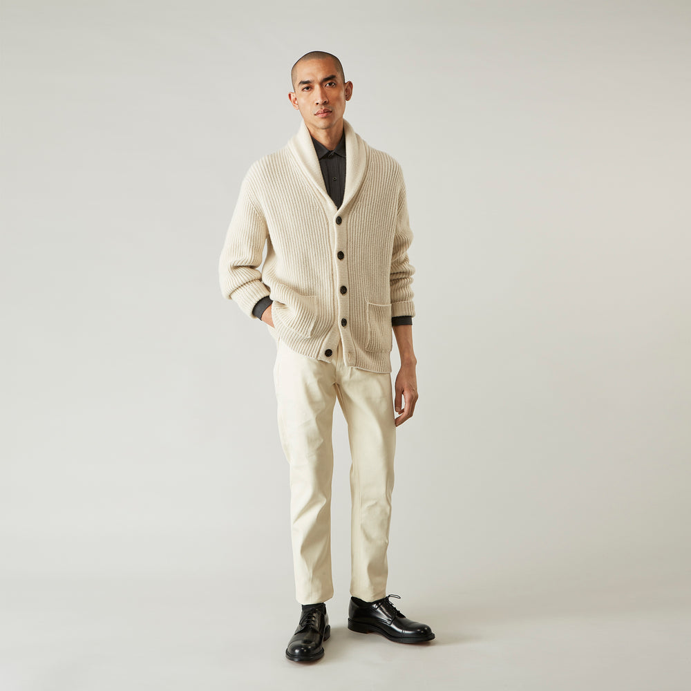 A pair of Turnbull & Asser Ecru Sanforized Denim Jeans with five pockets, button closure, and silver rivets, shown against a plain white background.