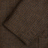 View 4 of product The Turnbull & Asser Brown Gingham Check Sports Jacket features a single button closure, notched lapels, and two front flap pockets, shown against a plain white background.