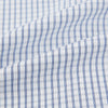 View 6 of product The Turnbull & Asser Blue Multi Tattersall Check Mayfair Shirt is a long-sleeved, button-down shirt featuring a small blue and white check pattern, pointed collar, and cuffs, shown laid flat on a white background.
