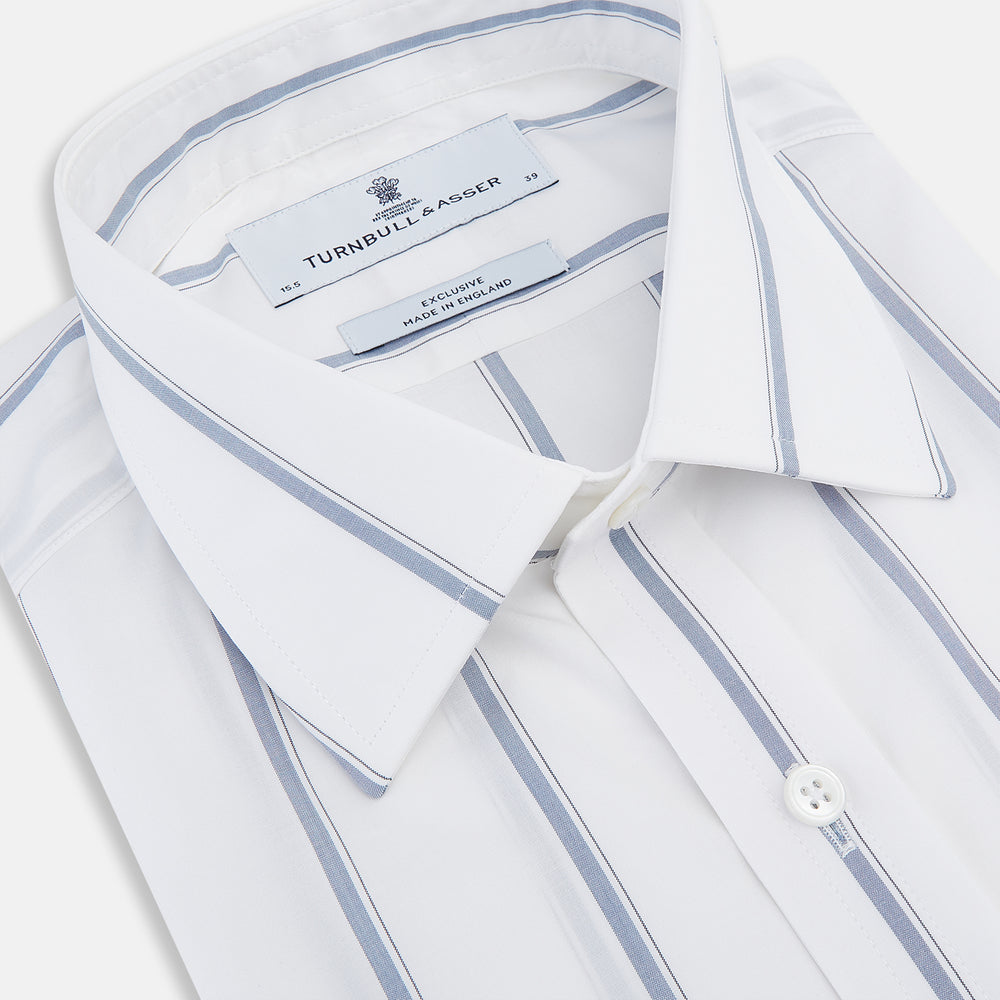The Turnbull & Asser Steel Grey Track Stripe Mayfair Shirt is a long-sleeve Italian cotton shirt with vertical stripes, a button-down front, and classic collar, shown laid flat on a white background.
