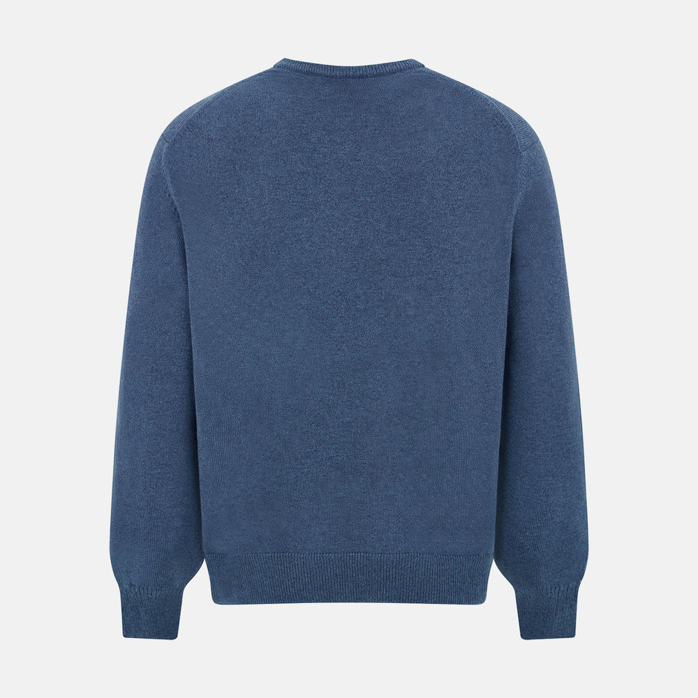 Turnbull & Asser’s Pacific Blue Cashmere V-Neck Jumper features ribbed cuffs, hem, and neckline, shown on a white background.