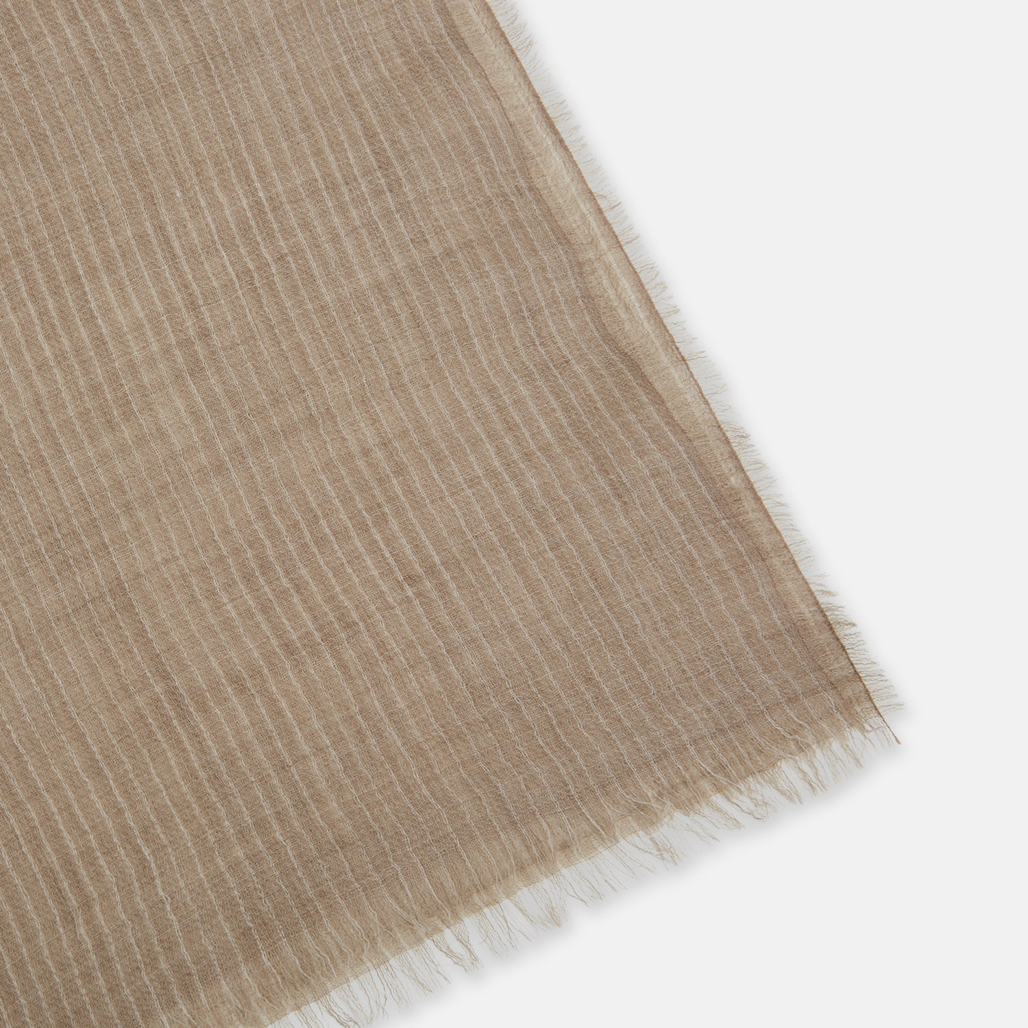 View 2 of product A Turnbull & Asser Beige and White Striped Cashmere Scarf, featuring a subtle pattern and fringed edge, is neatly folded and knotted against a plain white background.