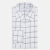View 5 of product The Turnbull & Asser Grey Grid Check Mayfair Shirt features a classic collar and buttoned cuffs, crafted from fine Italian cotton with a grey grid check on white, and is shown against a plain white background.