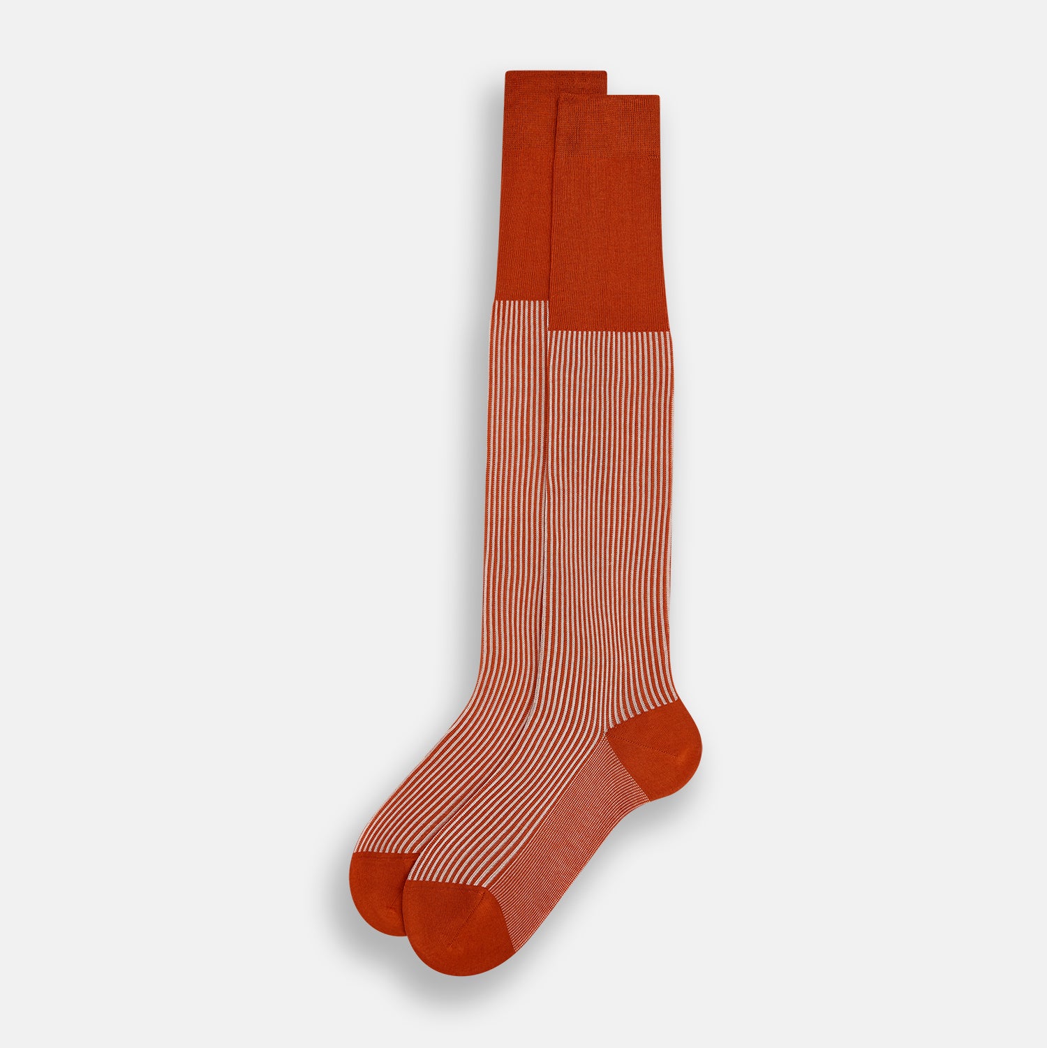 View 2 of product Turnbull & Asser's Rust/White Thin Striped Long Socks feature thin vertical stripes with a solid burnt orange cuff, heel, and toe. A single over-the-calf sock displayed on white background—ideal for those seeking stylish long socks.