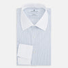 View 5 of product The Turnbull & Asser Pale Blue and Navy Grid Check Shirt features a contrast T&A collar and cuffs, long sleeves, and a button-down front, all displayed on a plain white background.