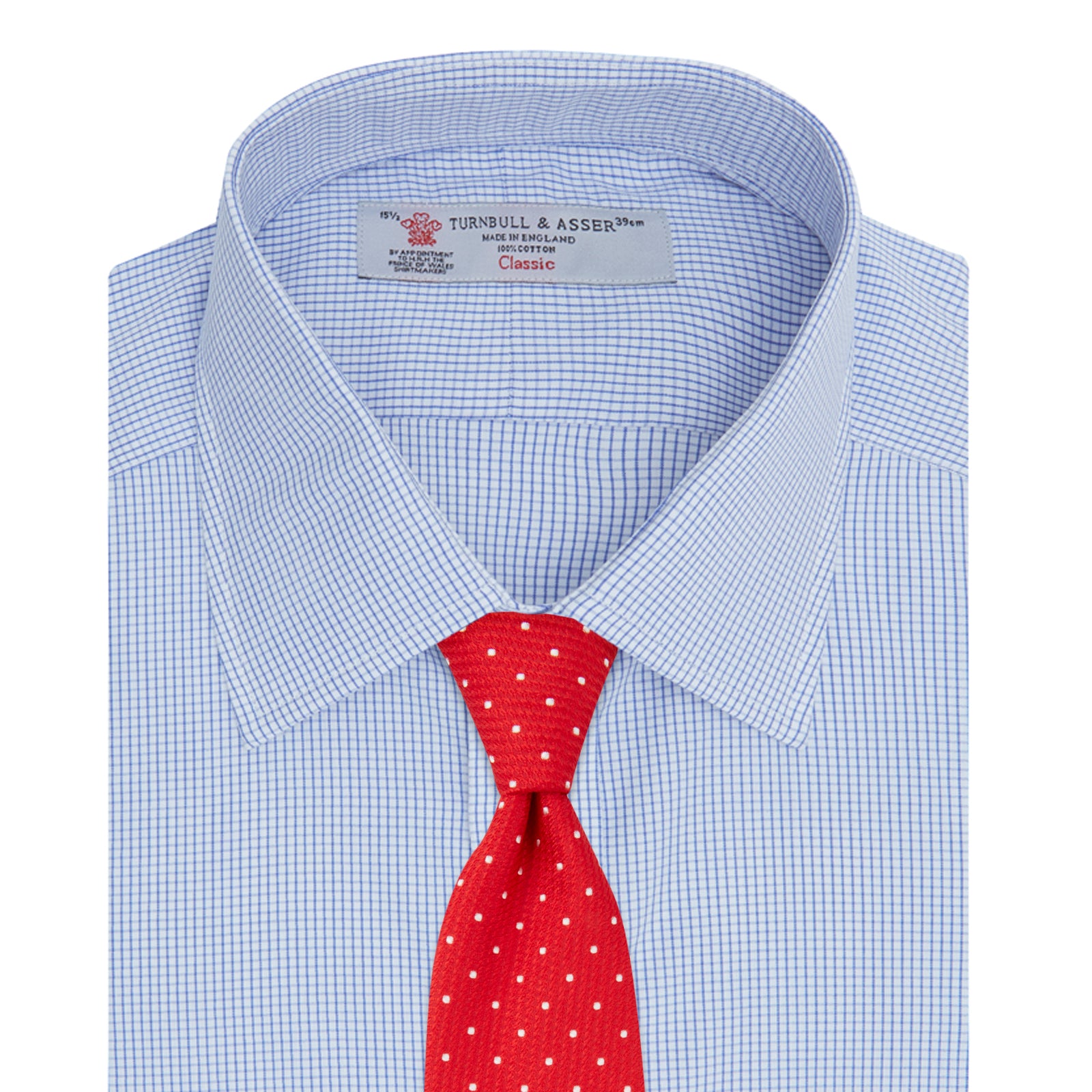 View 6 of product A neatly folded Turnbull & Asser Blue Grid Check Shirt features a T&A collar, 3-button cuffs, white buttons, and subtle British style. The blue and white check cotton design displays the brand label inside the collar.