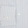 View 4 of product The Turnbull & Asser Pale Blue and Navy Grid Check Mayfair Shirt is a long-sleeve, button-up shirt made from fine Italian cotton, featuring a pointed collar and buttoned cuffs, shown against a plain white background.