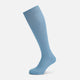 A single Turnbull & Asser Pale Blue Long Sock, featuring a ribbed texture and crafted from mercerised Egyptian cotton, is displayed upright on a plain white background.
