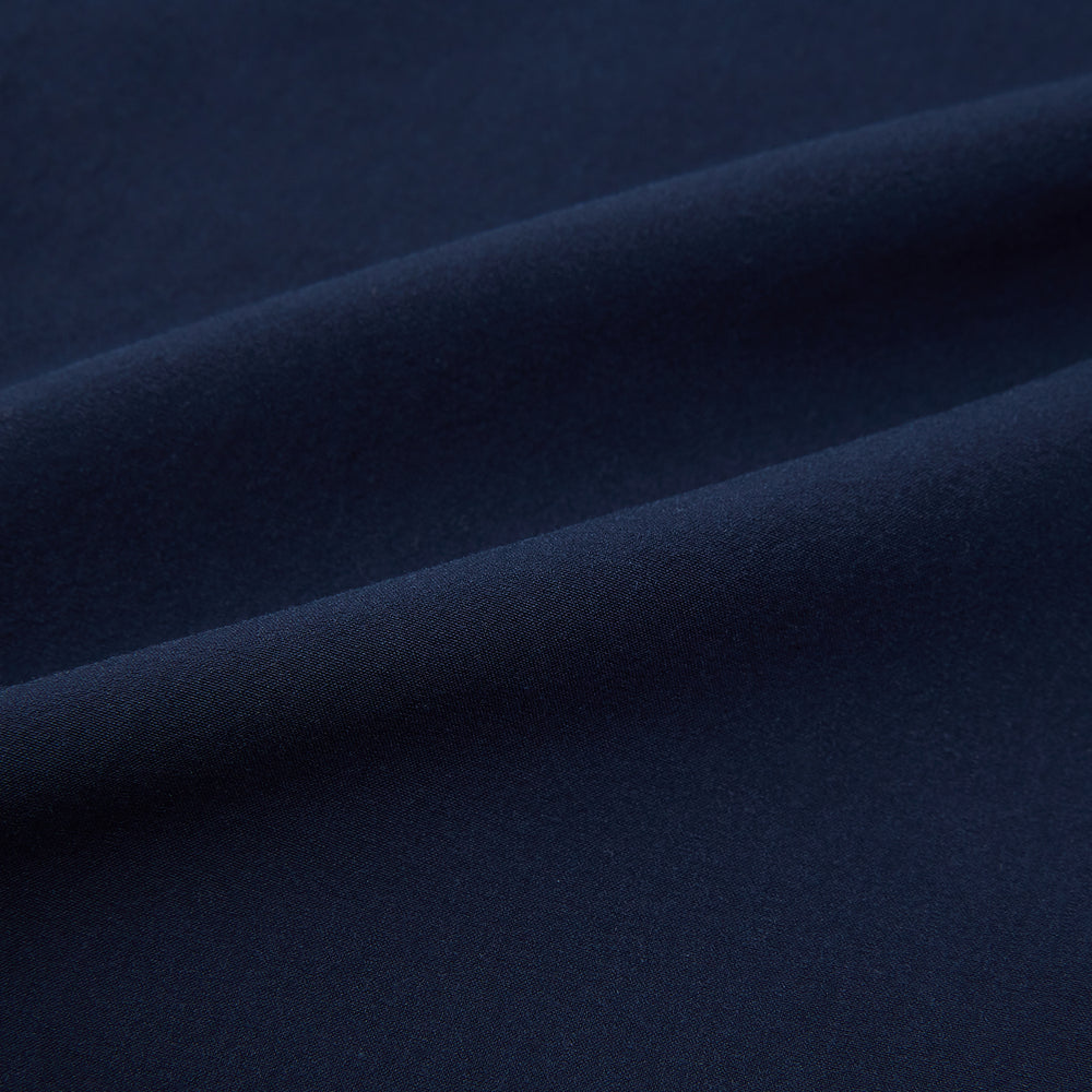 Turnbull & Asser Navy Winston Trousers in high-twist cotton, featuring a straight-leg cut, button and zipper closure, belt loops, and side pockets, displayed on a plain white background.