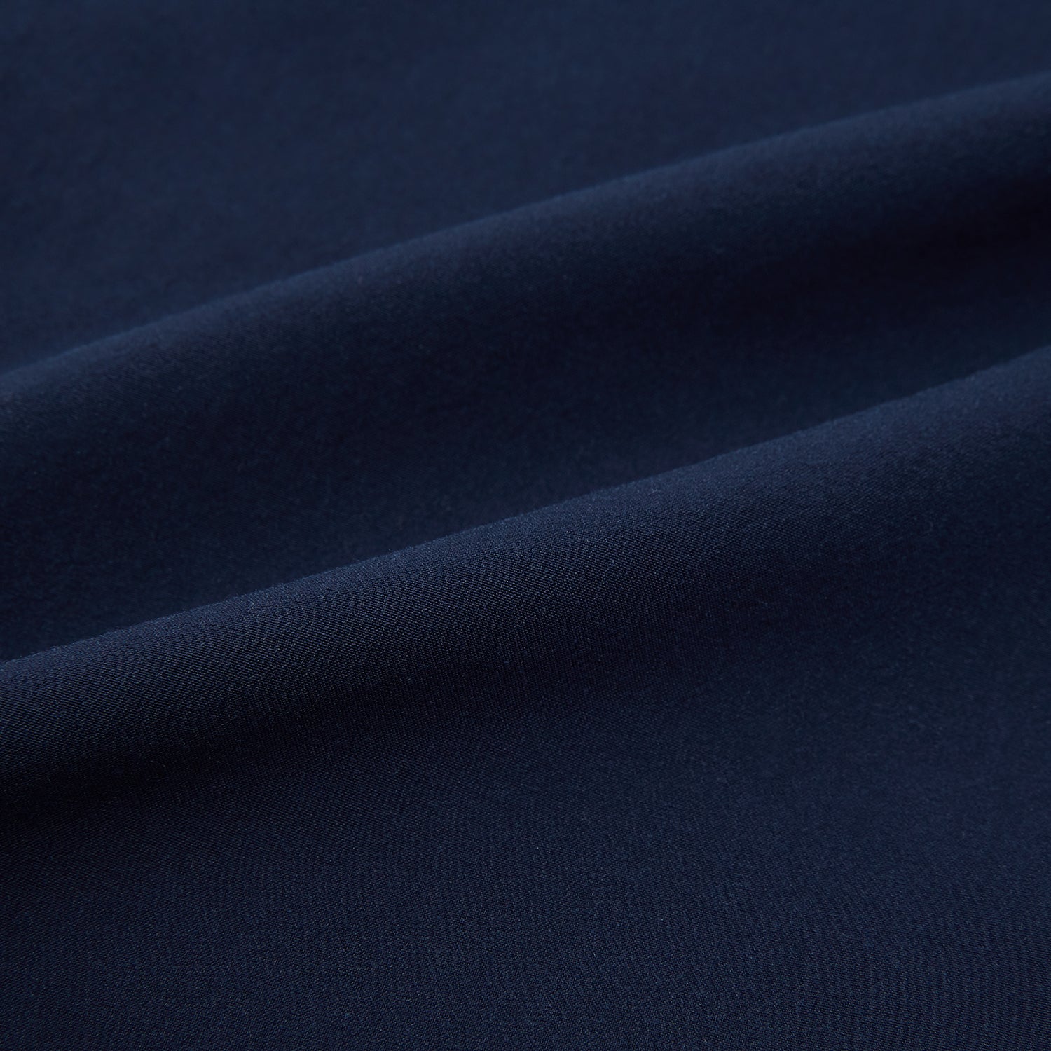 View 7 of product Turnbull & Asser Navy Winston Trousers in high-twist cotton, featuring a straight-leg cut, button and zipper closure, belt loops, and side pockets, displayed on a plain white background.