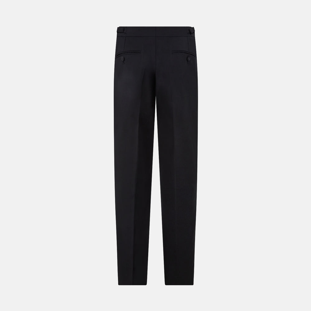 The Turnbull & Asser Black Single Breasted Dinner Suit features fine wool, a satin shawl collar jacket, and matching trousers—perfect formal wear, shown on a plain white background.