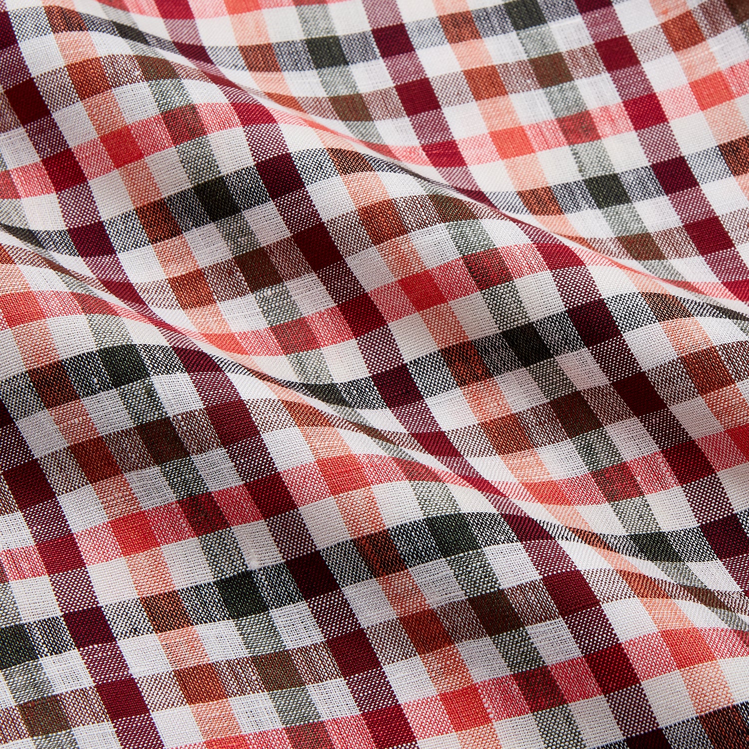 View 4 of product The Turnbull & Asser Red and Green Check Linen Blend Weekend Fit Hayne Shirt features a classic plaid pattern in red, white, black, and green, with a Dorset button-down collar and long sleeves. Displayed on a white background.