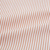 View 8 of product The Orange Multi Stripe Westminster Shirt by Turnbull & Asser features thin vertical orange and white stripes, a Turnbull collar, and long sleeves, elegantly displayed flat against a white background.