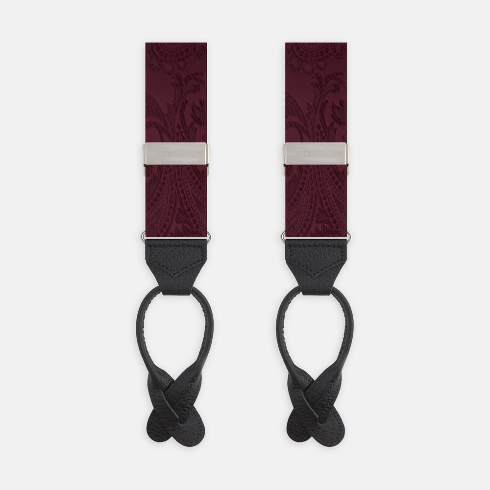 The Turnbull & Asser Burgundy Paisley Adjustable Silk Braces feature black leather loops and silver adjusters, shown on a plain white background.
