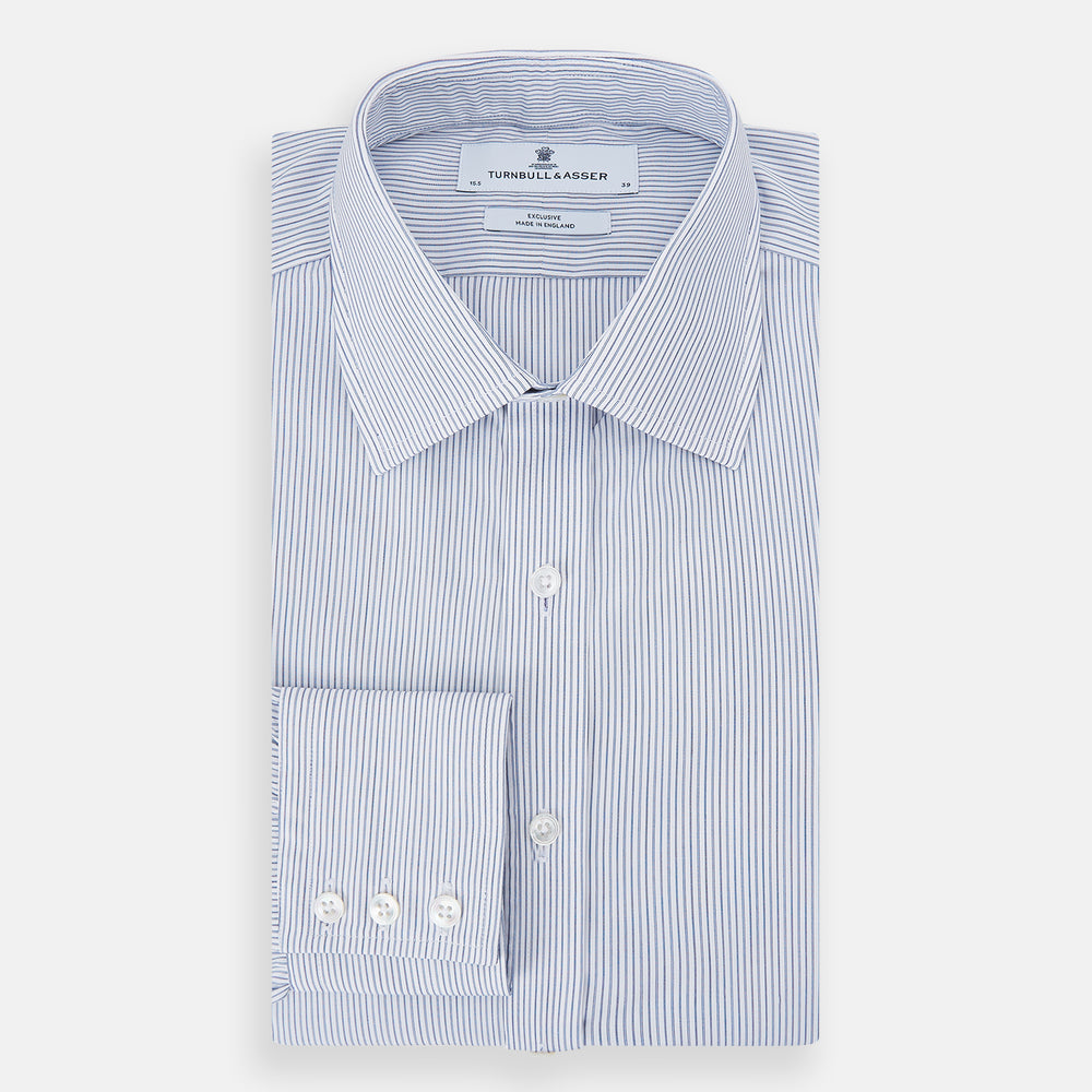 The Blue Ticking Pinstripe Mayfair Shirt by Turnbull & Asser features long sleeves, a button-down front, and classic T&A collar, shown on a plain white background.