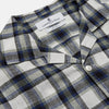 View 4 of product A Green Multi Check Linen Holiday Fit Winnington Shirt by Turnbull & Asser, featuring a check pattern and revere collar, displayed flat on a white background.