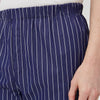 View 4 of product Turnbull & Asser Navy Stripe Modern Pyjama Trousers in superfine cotton with white stripes, elastic waistband, and relaxed fit, presented against a plain white background.