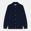 View 1 of product The Turnbull & Asser Navy Cashmere Duncan Knitted Shirt, a button-up with collar, long sleeves, chest pocket, and straight hem, is shown laid flat on a white background.
