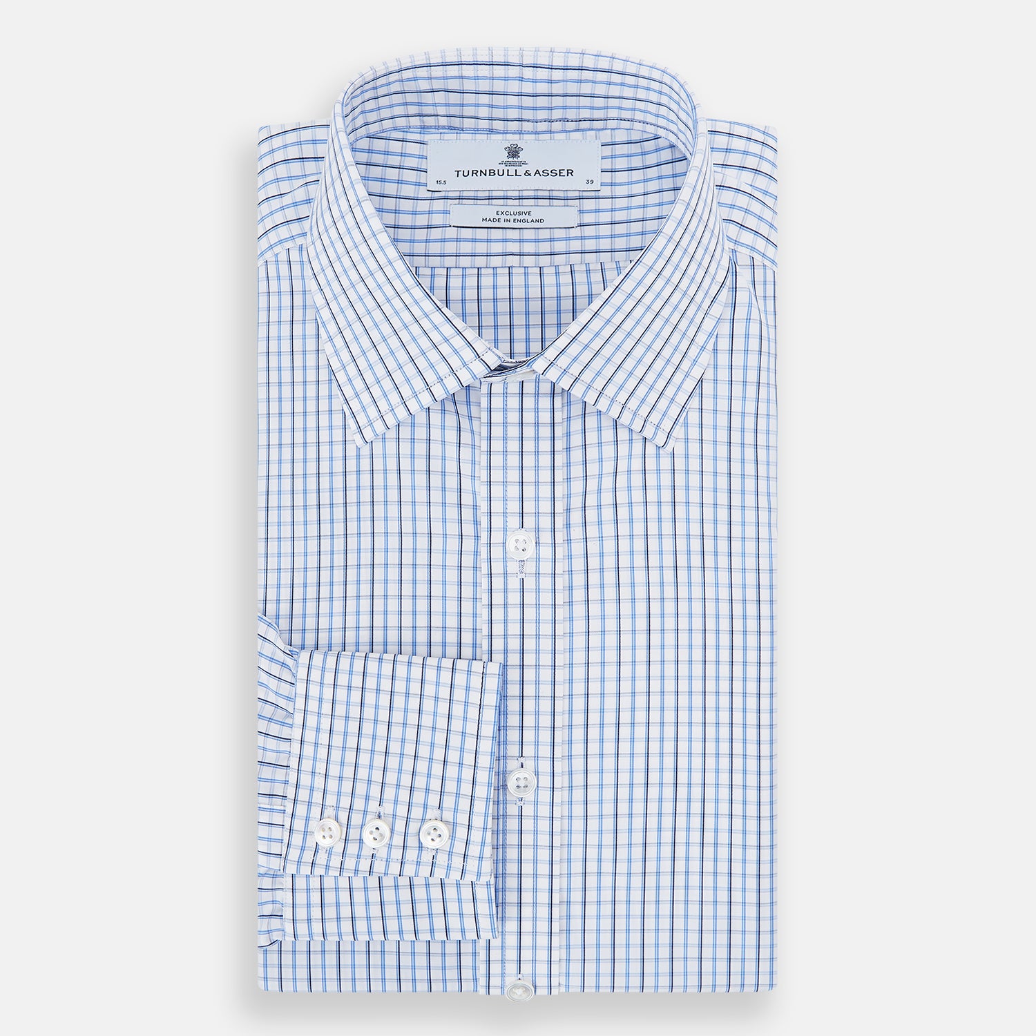 View 5 of product The Turnbull & Asser Blue and Navy Tattersall Check Mayfair Shirt features long sleeves, a button-up front, and a T&A collar in the classic Mayfair fit, shown flat against a white background.