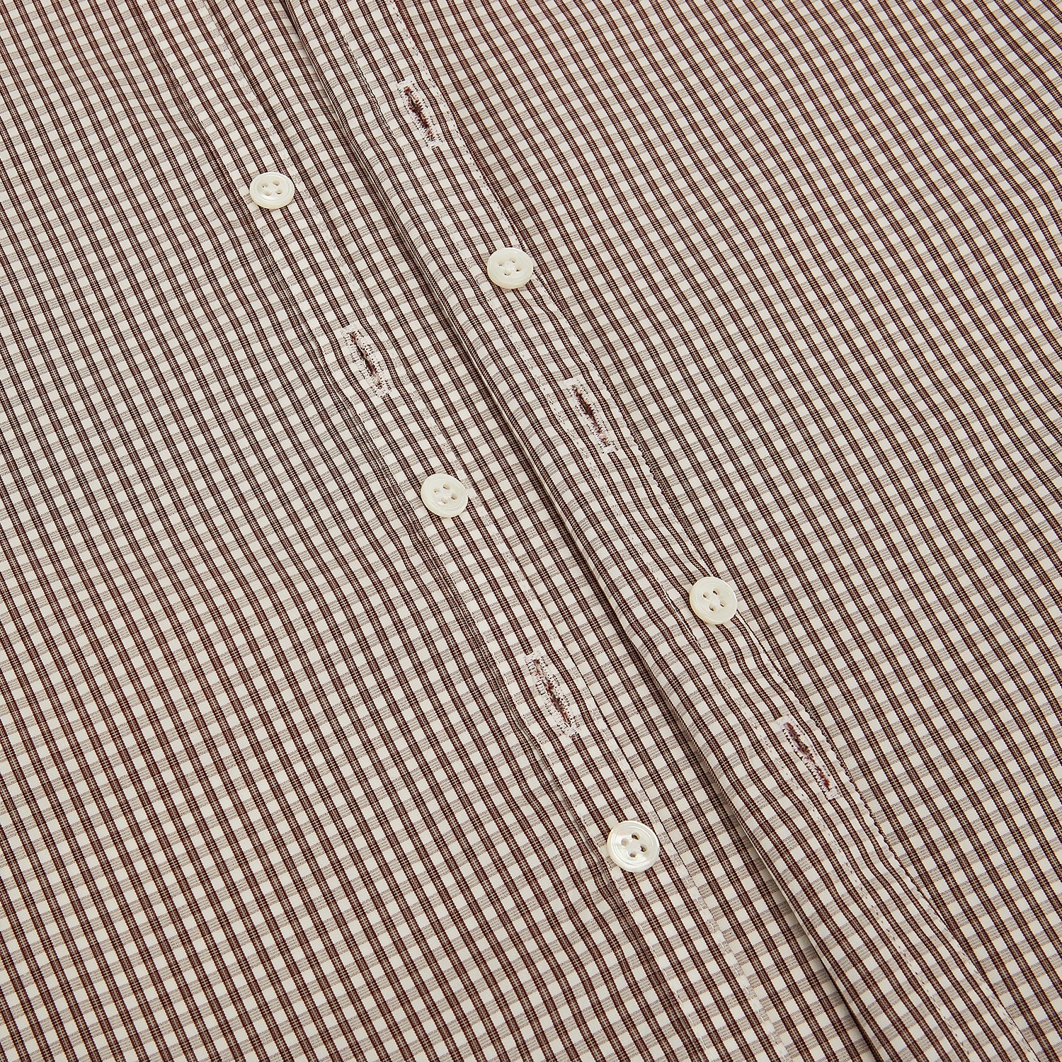 View 7 of product The Turnbull & Asser Burgundy Micro Check Westminster Shirt is a long-sleeved button-up with a classic collar and tailored fit, featuring a subtle micro check pattern, shown against a white background.