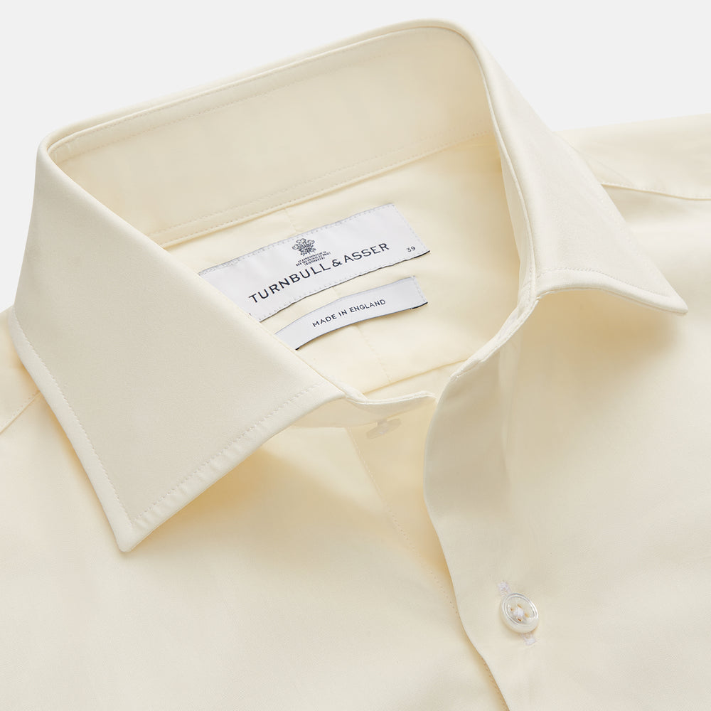 The Turnbull & Asser Tailored Fit Cream Cotton Shirt features a Kent collar and 3-button cuffs, shown against a plain white background.
