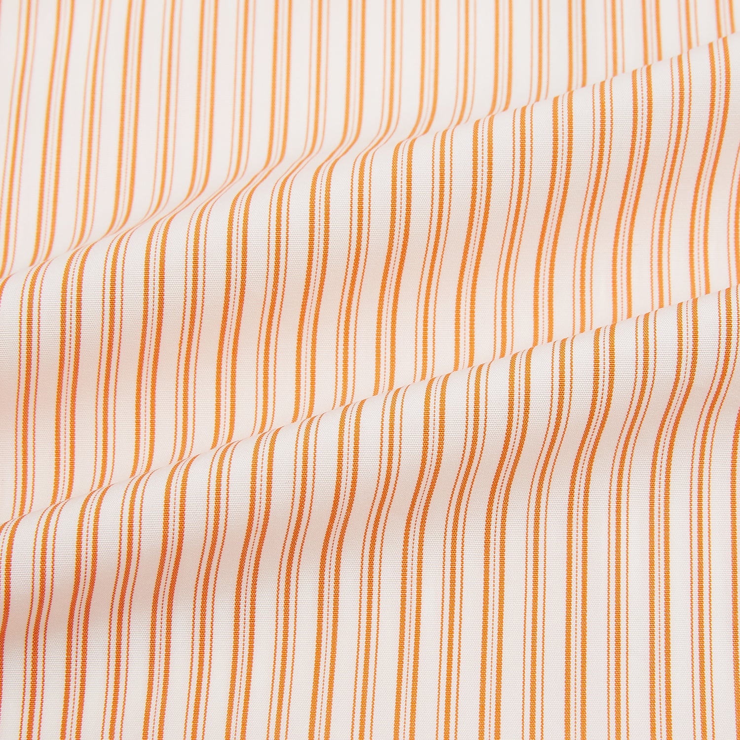 View 6 of product The Turnbull & Asser Orange Ticking Stripe Mayfair Shirt features thin vertical stripes, a classic T&A collar, and buttoned cuffs, shown on a plain white background.