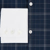 View 4 of product The Turnbull & Asser Indigo Windowpane Check Windsor Shirt features a contrast T&A collar and cuffs, highlighting British craftsmanship. It is displayed flat on a white background.