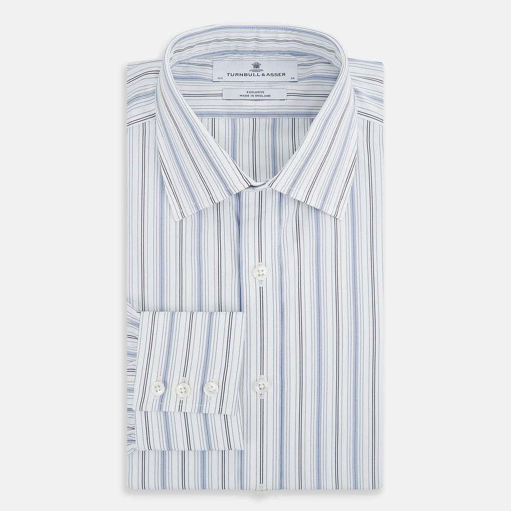 The Turnbull & Asser Navy and Blue Multi Stripe Mayfair Shirt features long sleeves, a T&A collar, and buttoned cuffs, shown against a white background.