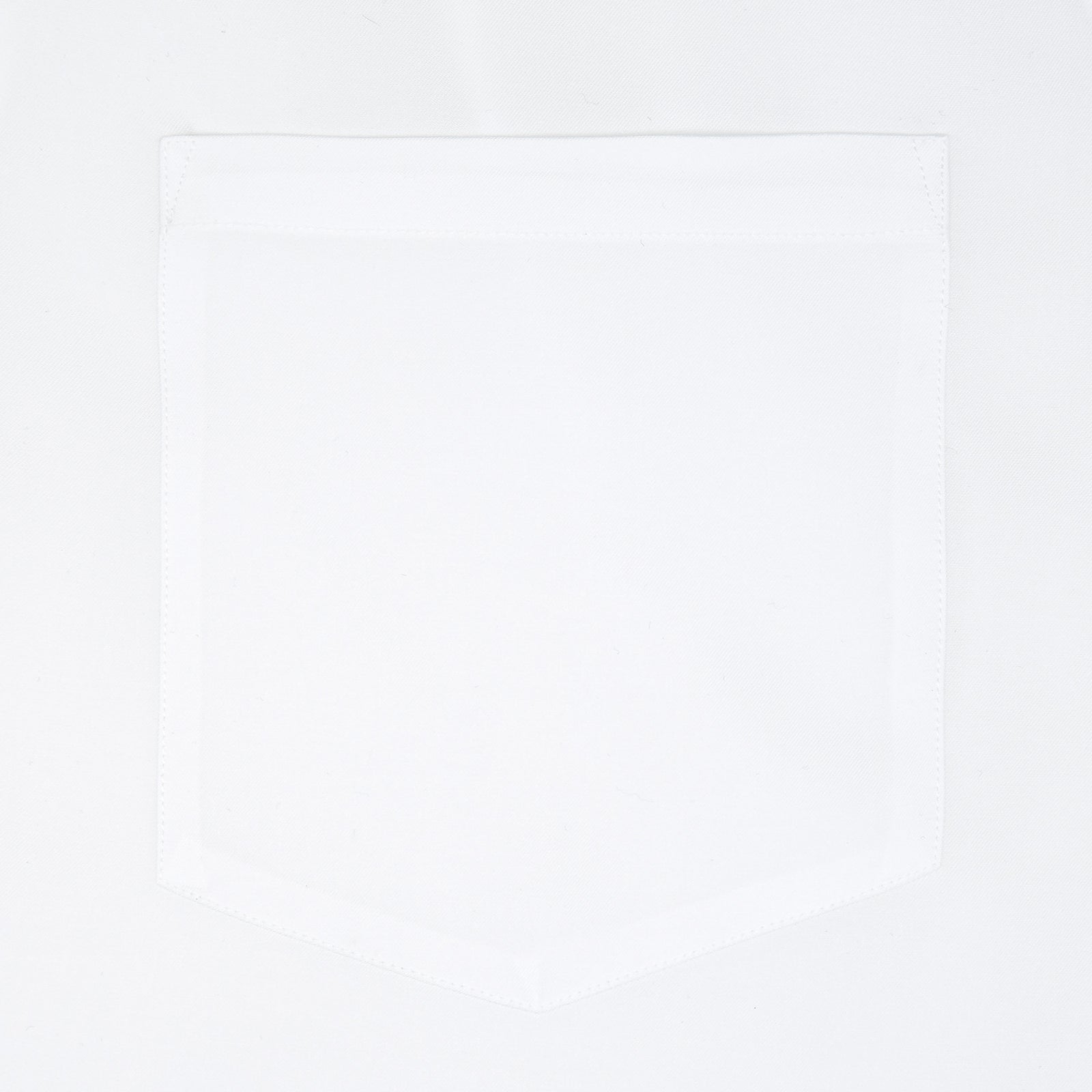 View 4 of product The White Lyocell Hampton Open Collar Shirt by Turnbull & Asser is neatly folded with visible label, notched collar, and buttons, displayed against a light grey background.