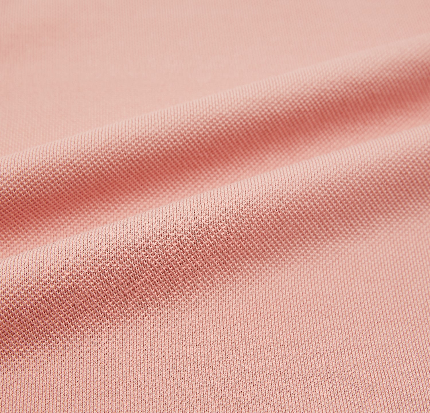 View 5 of product The Orange Polo Shirt by Turnbull & Asser features short sleeves, a collar, three-button placket, and a small buttoned chest pocket in soft cotton jersey—timeless men's style laid flat on a white background.