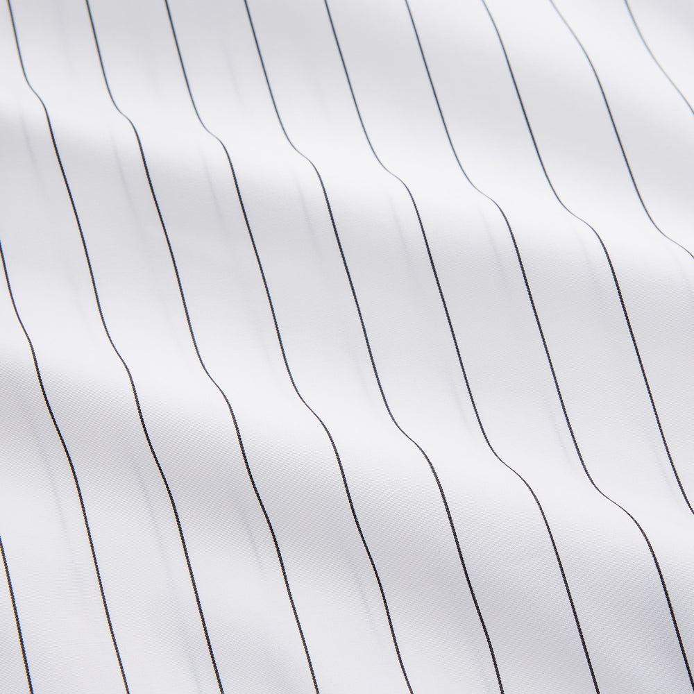 The Turnbull & Asser Black Fine Stripe Cotton Regular Fit Mayfair Shirt features a T&A collar, buttoned cuffs, and black fine stripes, displayed flat on a white background.