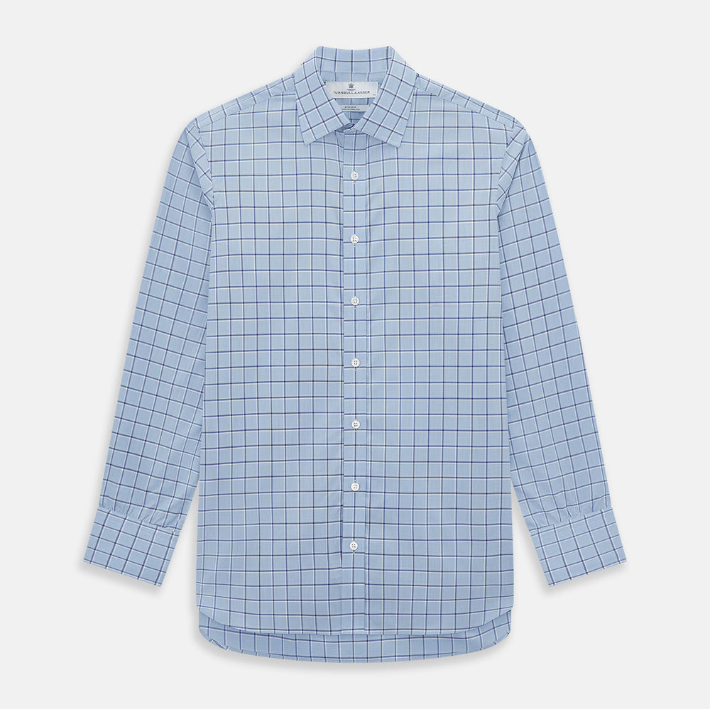 The Turnbull & Asser Blue and Navy Windowpane Mayfair Shirt features long sleeves, a T&A collar, buttoned cuffs, and Italian cotton in a blue and navy windowpane pattern, shown on a plain white background.