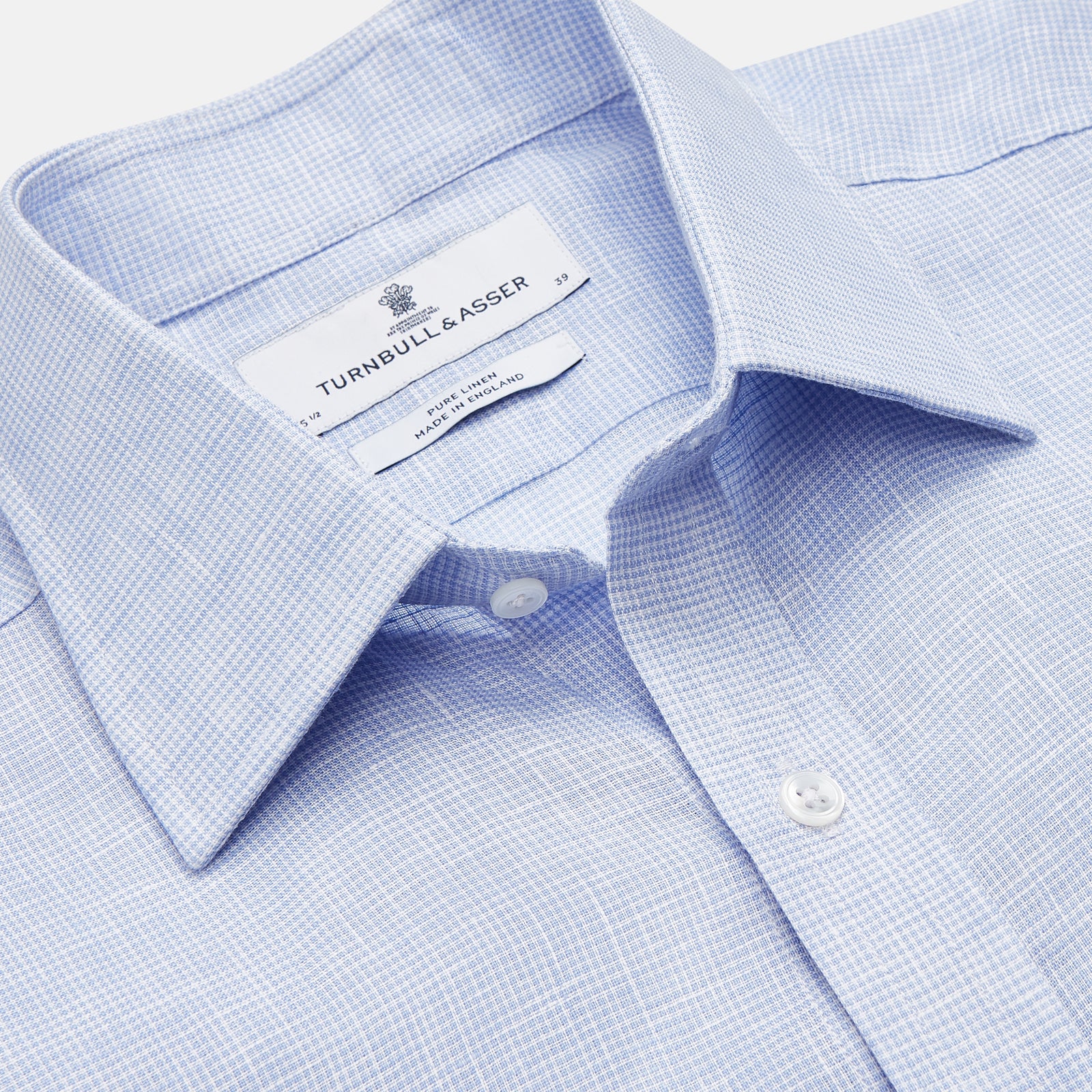 View 2 of product Turnbull & Asser's Pale Blue Check Linen Regular Fit Mayfair Shirt features a classic collar, front pocket, and buttoned cuffs—a breezy update to the traditional check shirt.