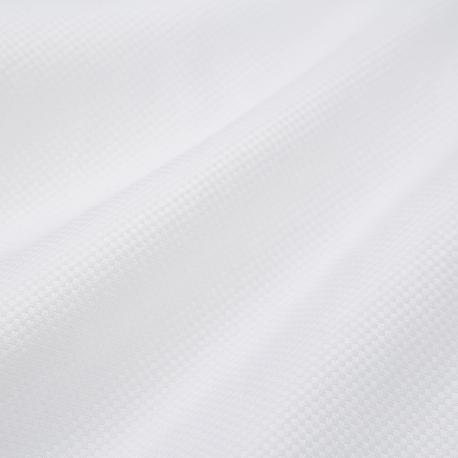 View 5 of product The Turnbull & Asser Casino Royale White Dress Shirt, as seen on James Bond, features a classic Bond collar, button-down front, and buttoned cuffs, shown on a white background.