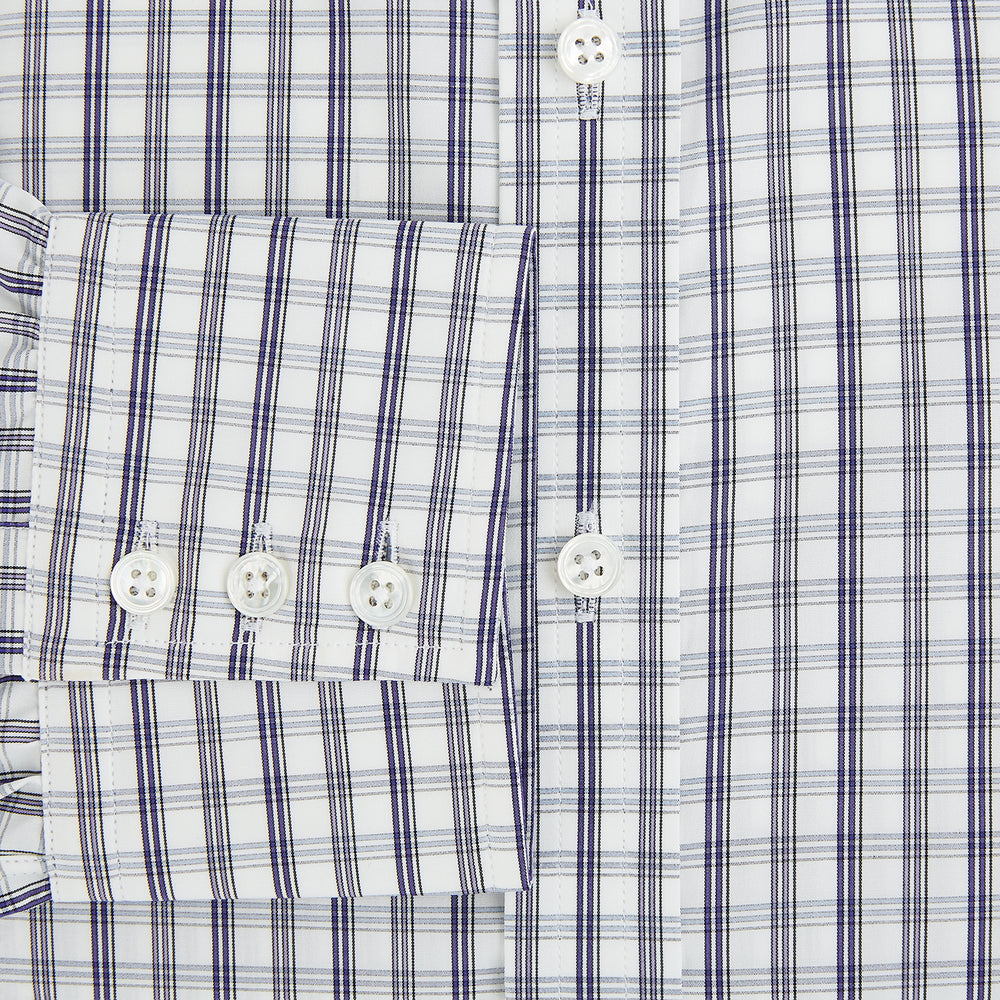 The Turnbull & Asser Purple Multi Check Mayfair Shirt is a long-sleeved, button-up cotton shirt with a collar and purple check pattern, perfect for formal wear and shown against a plain white background.