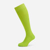 View 1 of product The Turnbull & Asser Lime Long Sock is a single bright green, knee-high sock with a ribbed texture, crafted from soft mercerised cotton, shown against a white background.