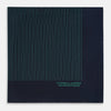 View 4 of product A Navy and Petrol Green Stripe Silk Pocket Square by Turnbull & Asser, featuring thin petrol green stripes and "Turnbull & Asser Hand Printed in England" in the bottom right corner. One corner is folded to display hand-rolled edges.