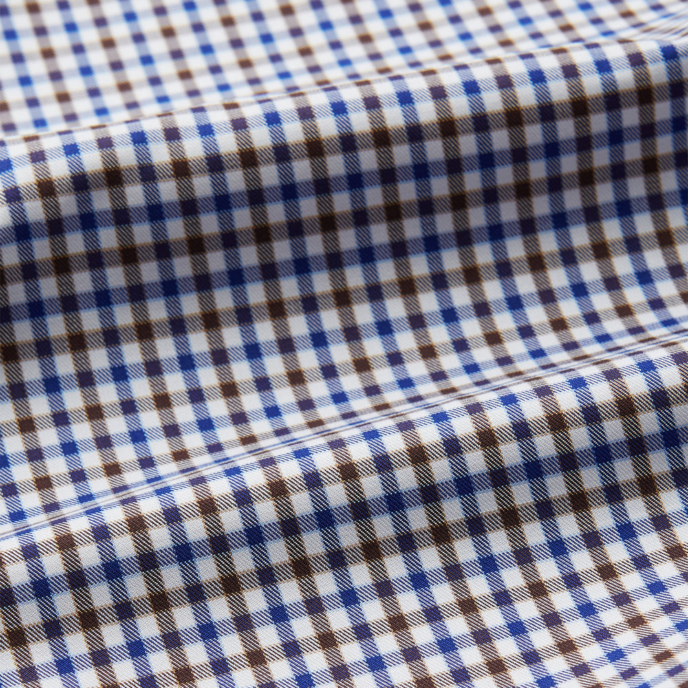 A must-have for any men's wardrobe, the Turnbull & Asser Brown and Blue Cotton Multi Check Weekend Fit Finch Shirt features long sleeves, button-down design, collar, and buttoned cuffs in a stylish check pattern.