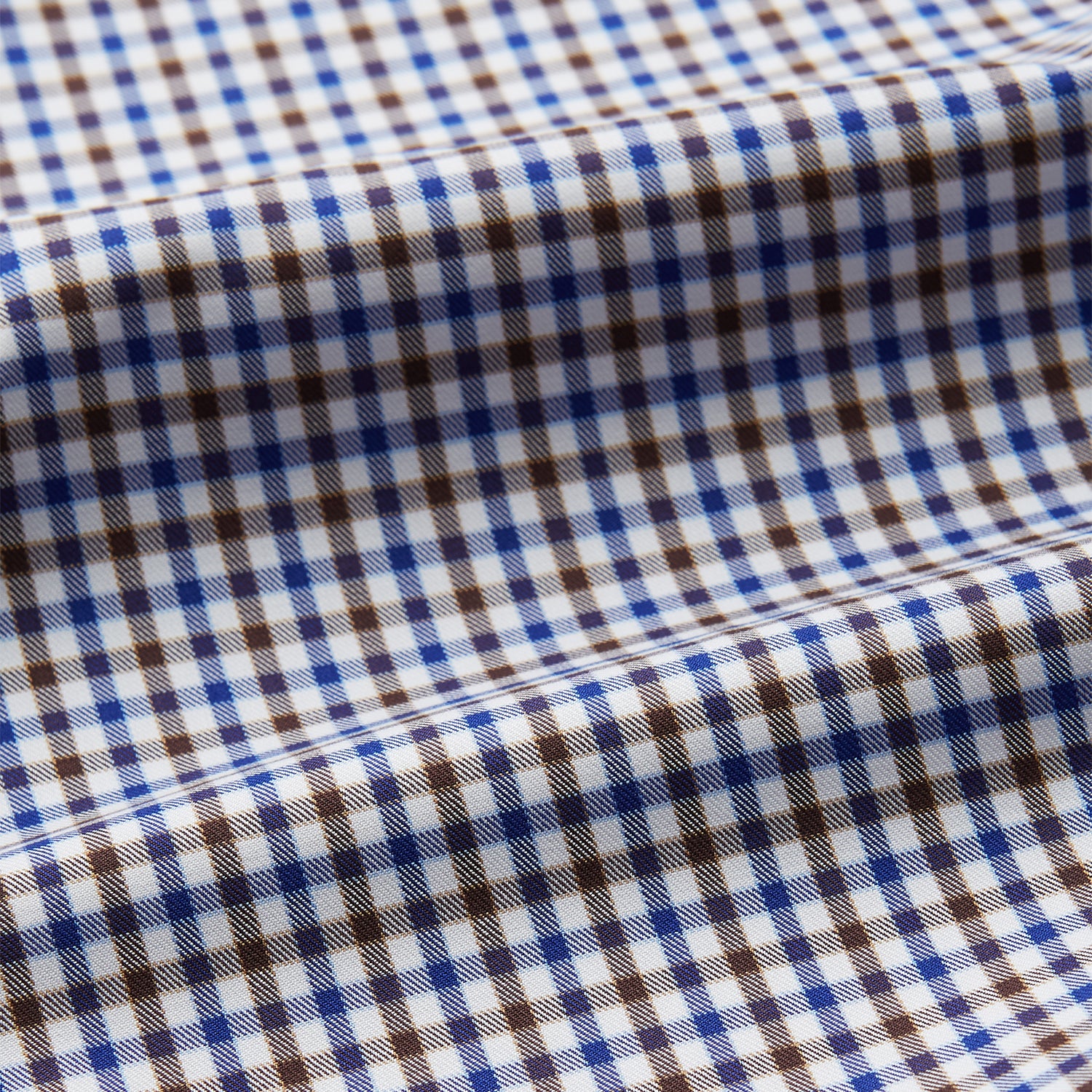 View 4 of product A must-have for any men's wardrobe, the Turnbull & Asser Brown and Blue Cotton Multi Check Weekend Fit Finch Shirt features long sleeves, button-down design, collar, and buttoned cuffs in a stylish check pattern.
