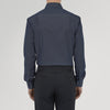 View 3 of product A neatly folded Turnbull & Asser Dark Blue Denim-Cashmere Shirt with a T&A collar and double cuffs, featuring black buttons, shown on a white background. The label inside the collar highlights its smart finish and refined style.