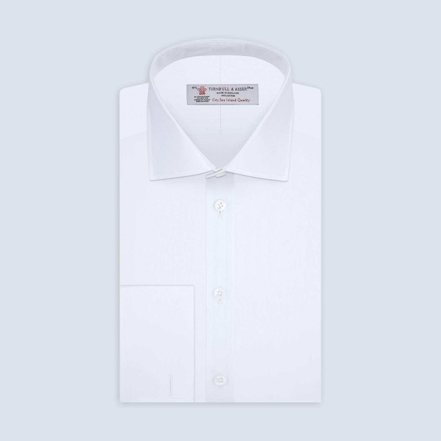 View 1 of product A White Self-On-Self Herringbone Sea Island Quality Cotton Shirt with Regent collar and double cuffs by Turnbull & Asser, displayed against a light gray background.