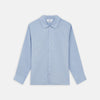 View 1 of product The Turnbull & Asser Slate Blue Chambray Holiday Fit Fellows Shirt features long sleeves and a classic collar, laid flat on a white background—a versatile summer piece for any occasion.