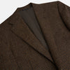View 2 of product The Turnbull & Asser Brown Gingham Check Sports Jacket features a single button closure, notched lapels, and two front flap pockets, shown against a plain white background.