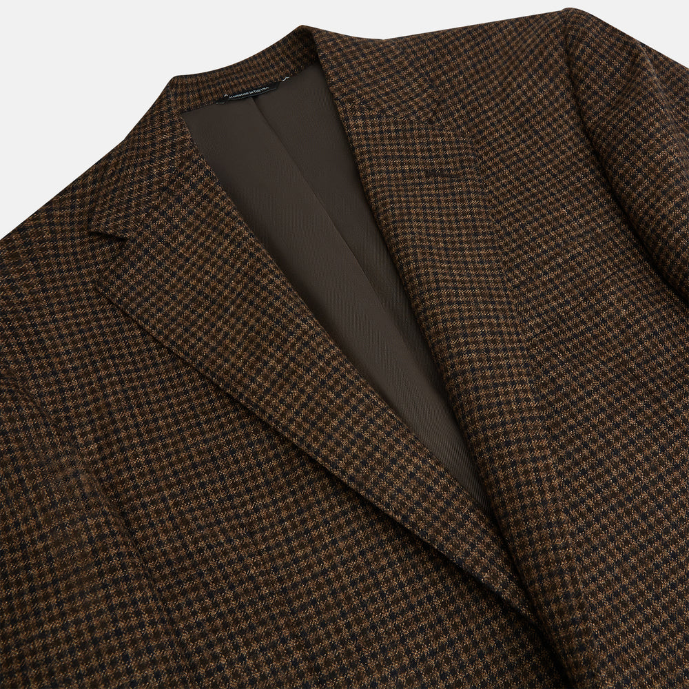 The Turnbull & Asser Brown Gingham Check Sports Jacket features a single button closure, notched lapels, and two front flap pockets, shown against a plain white background.
