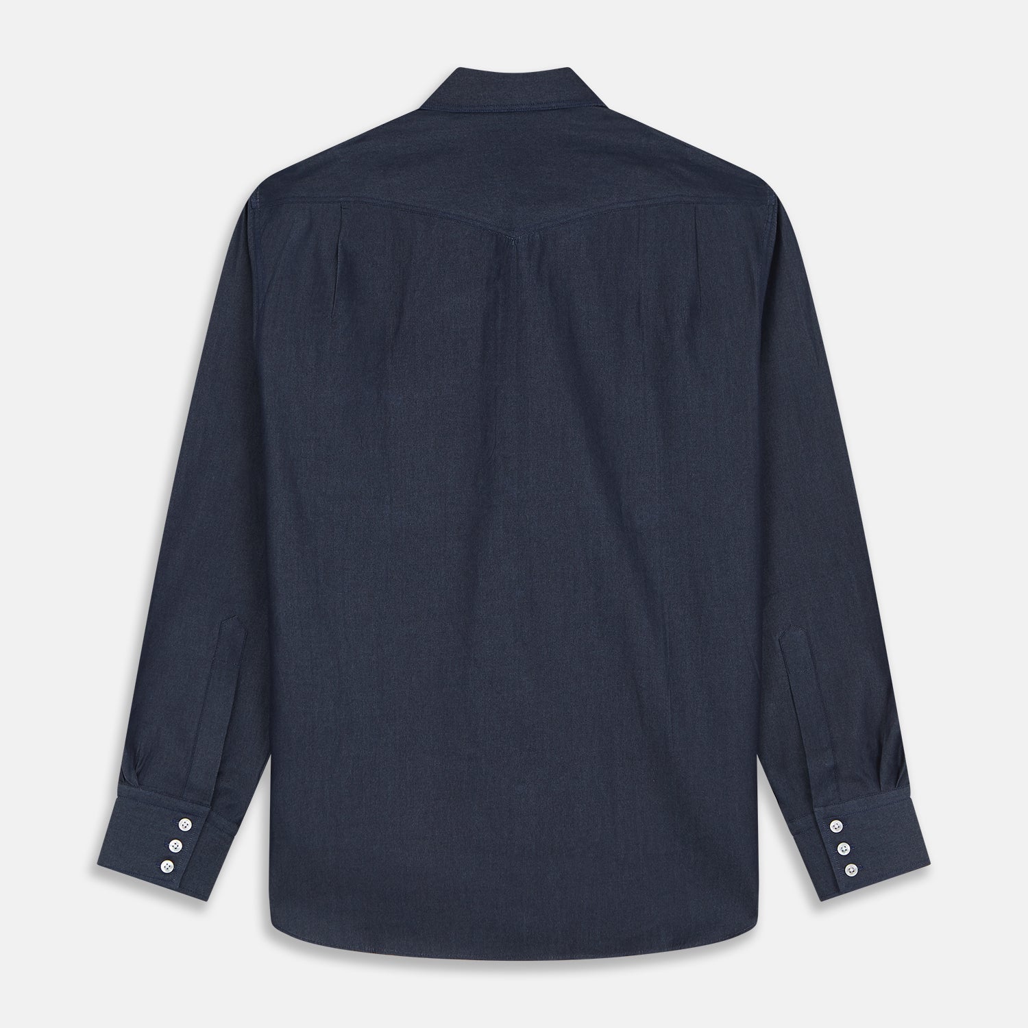 View 5 of product The Turnbull & Asser Navy Weekend Fit Larkin Shirt features a Dorset collar, long sleeves with 3-button cuffs, two chest pockets, and white snaps, shown laid flat against a white background.