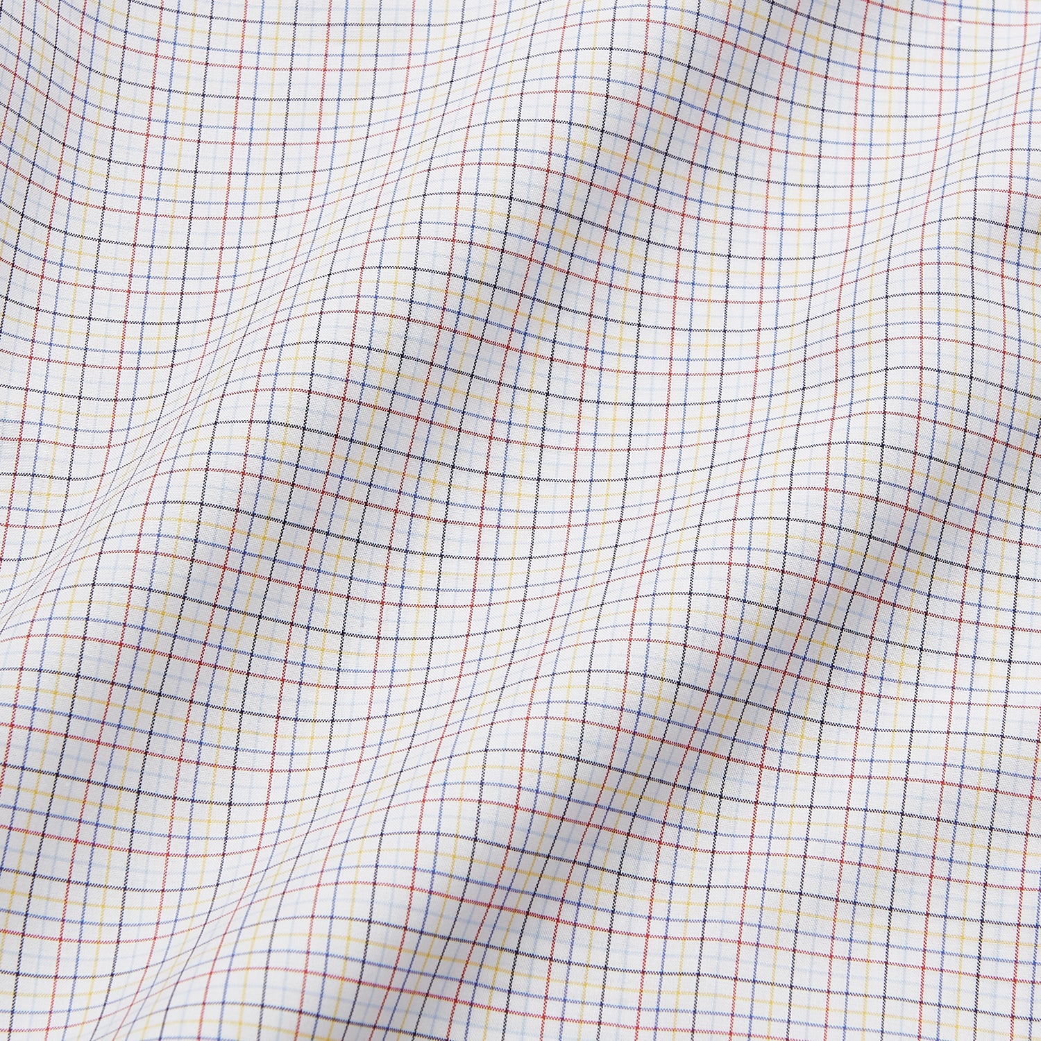 View 6 of product A man stands against a beige background, facing forward with a neutral expression and arms relaxed, wearing the Turnbull & Asser Red Multi Check Regular Fit Mayfair Shirt.